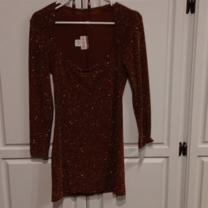 Woman's size L brown and gold mini dress. Caravelle collection.
